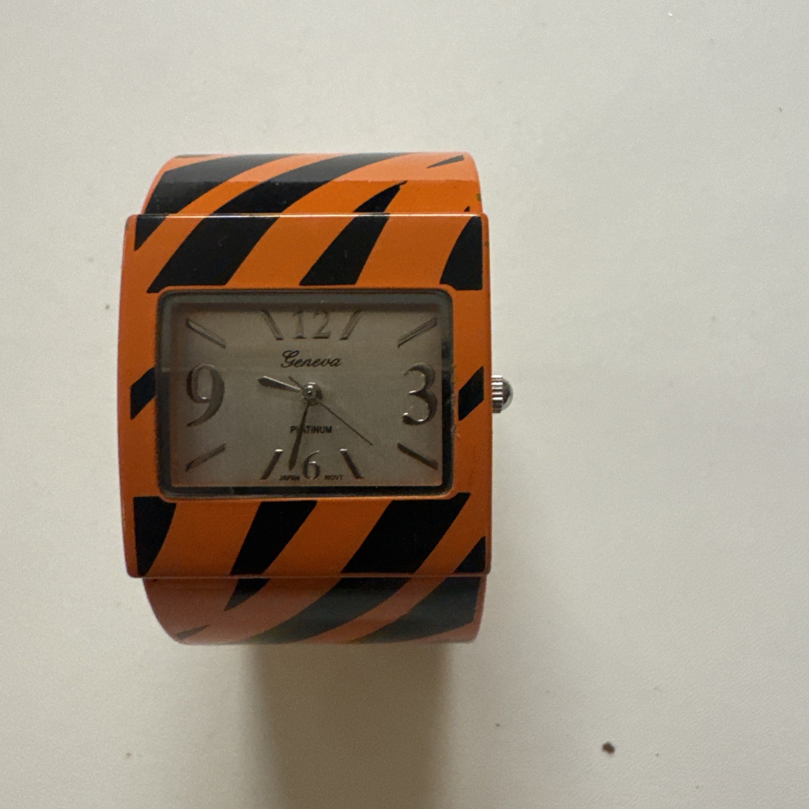Geneva Platinum Women’s Orange and Black Tiger Cuff Watch 80’s Style