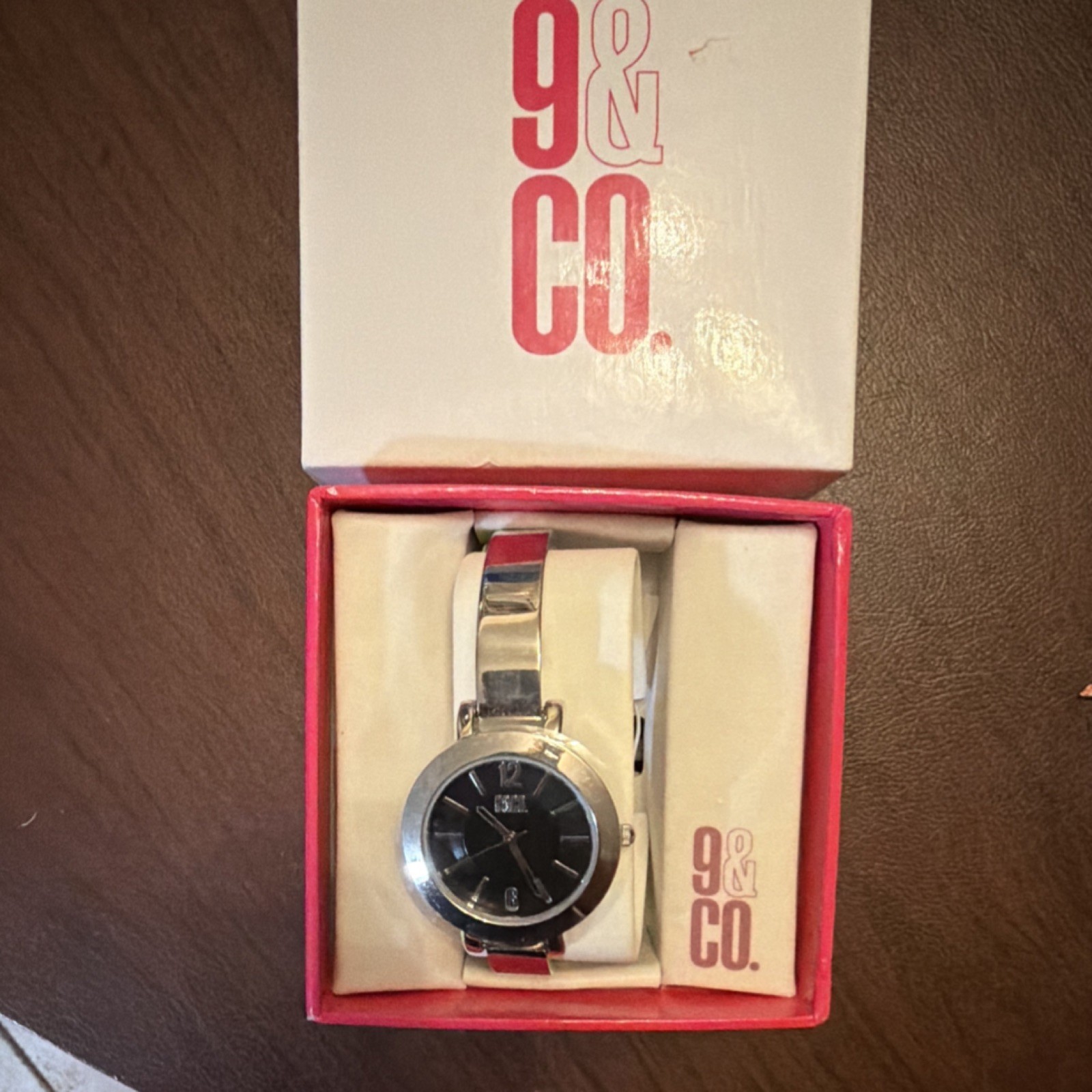Nine & Co Women’s Silver Metal Analog Wristwatch Black Dial Stick Indexes