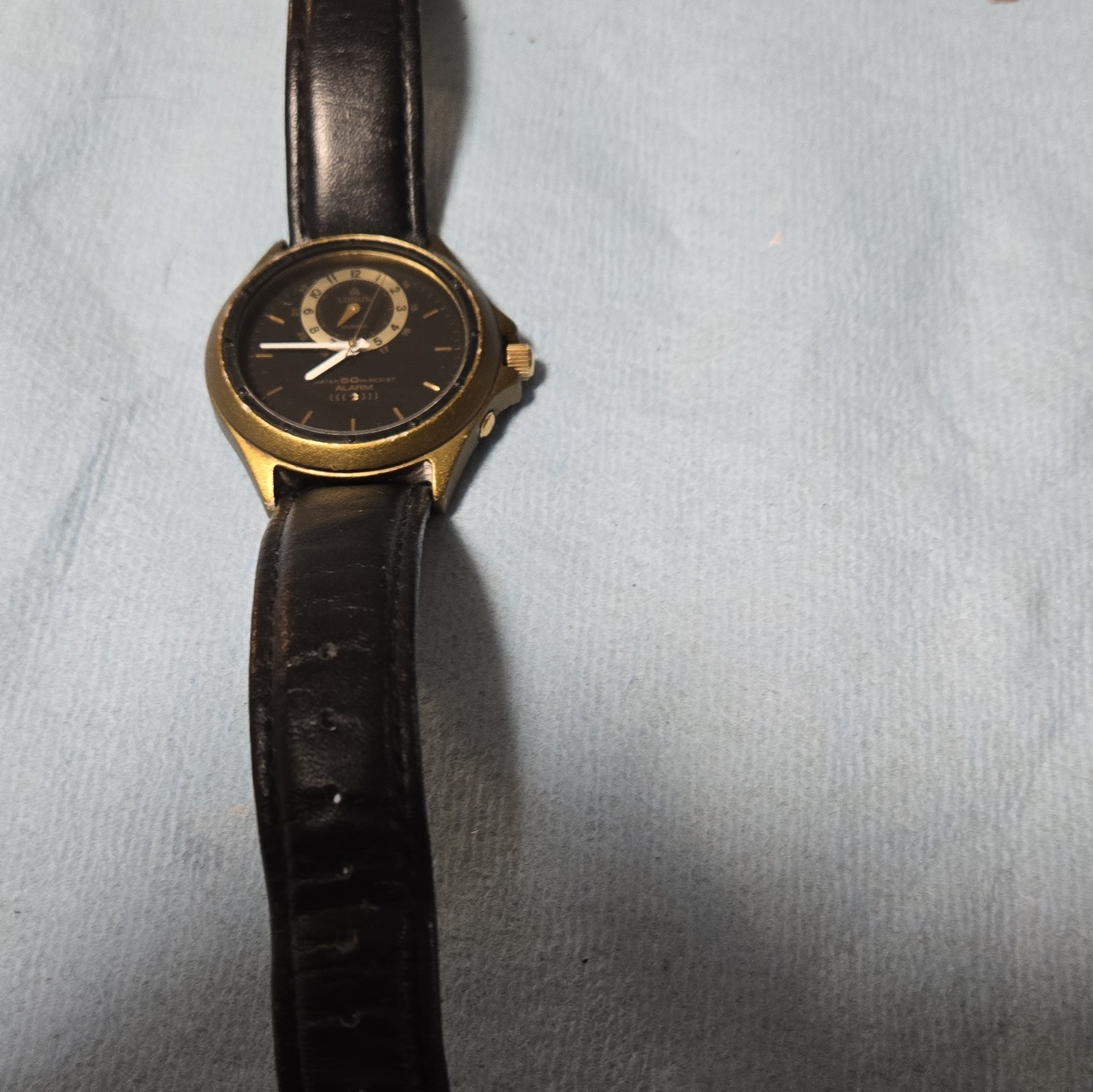 Lorus Quartz Alarm 50m Water Resist Black Dial Gold-Tone Case Black Leather