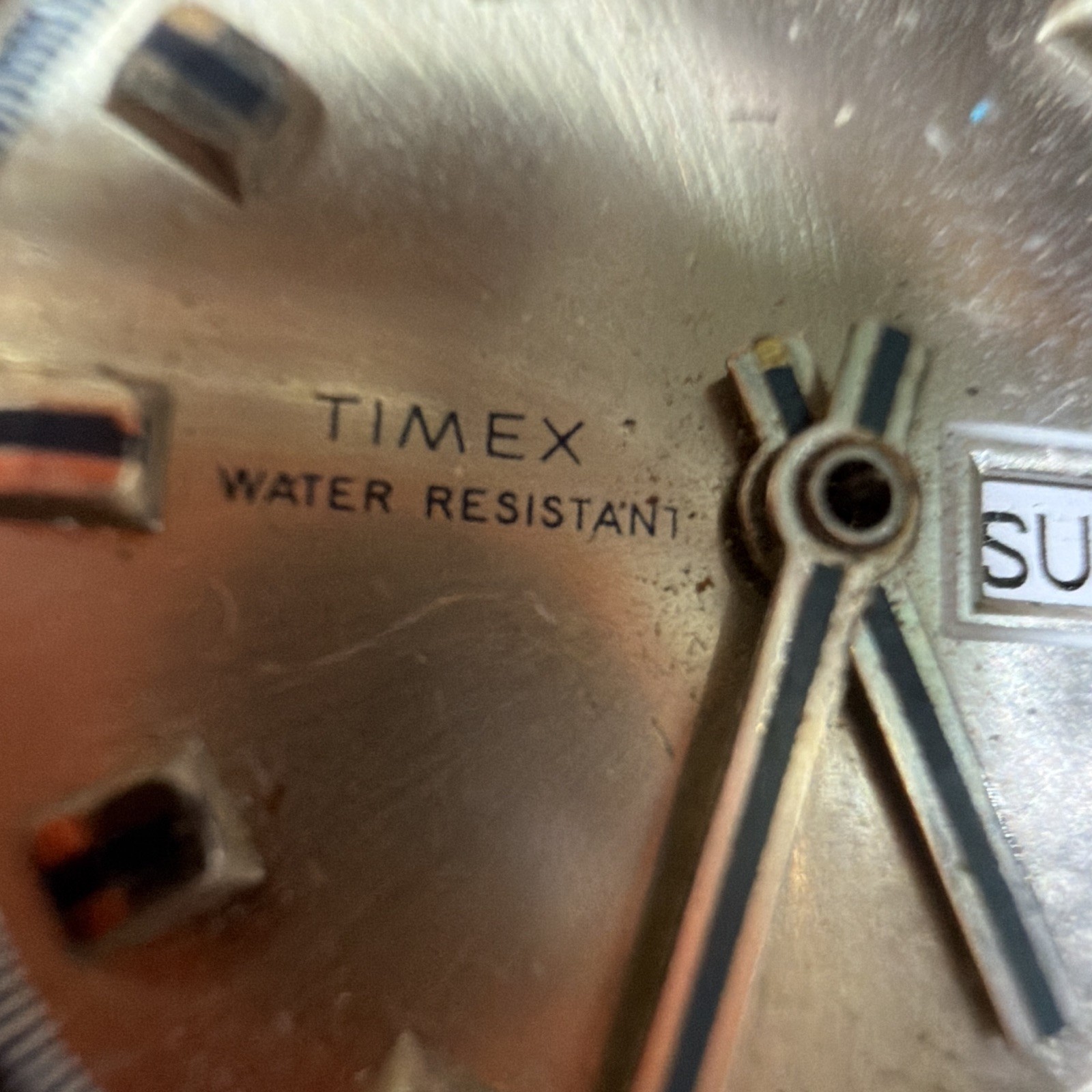 Timex Water Resistant Day/Date Analog Wristwatch Silver Dial Stick Indexes