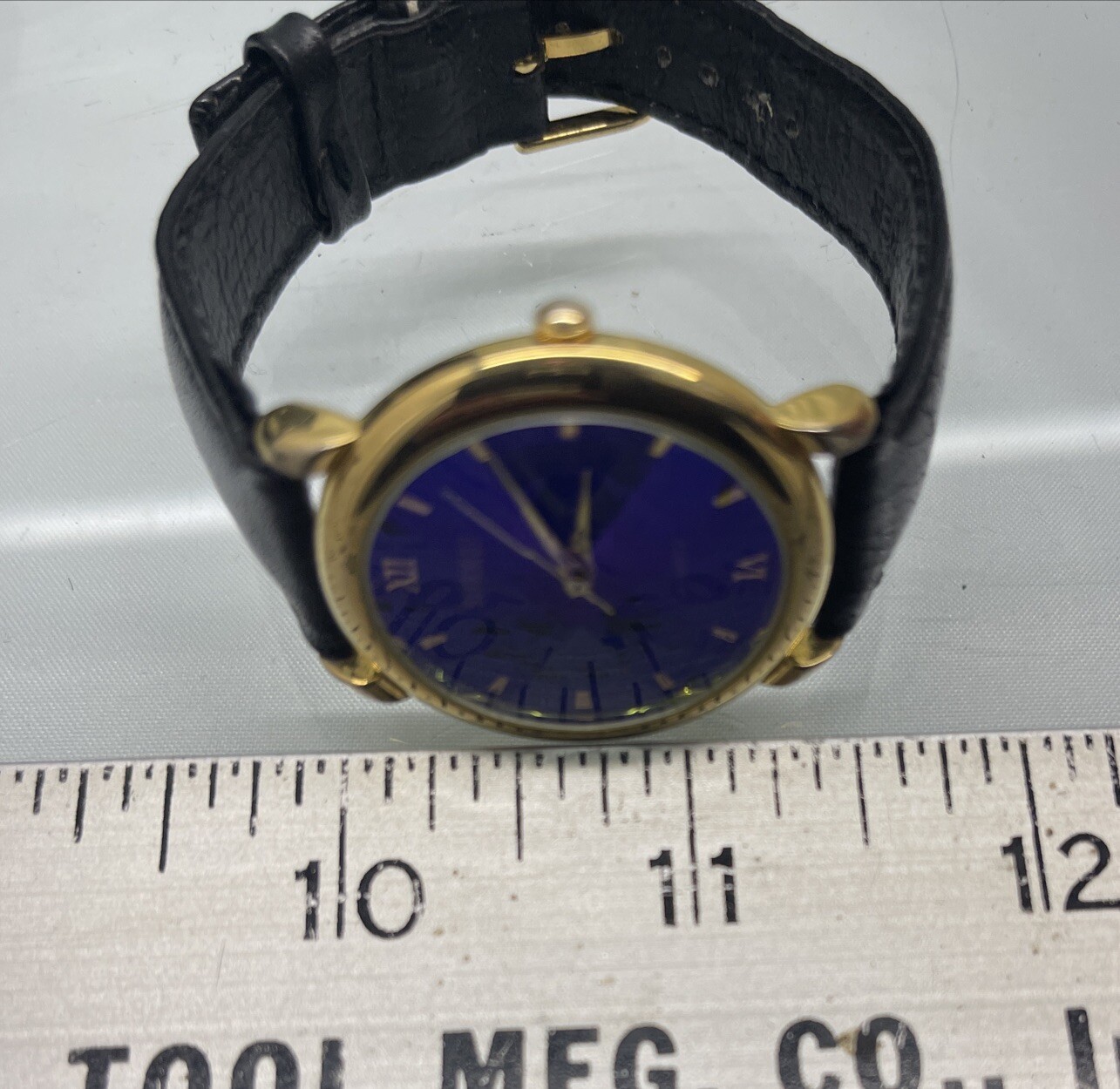 Gitano Watch Blue Purple Dial Black Leather Band – Angled Glass for Sparkle