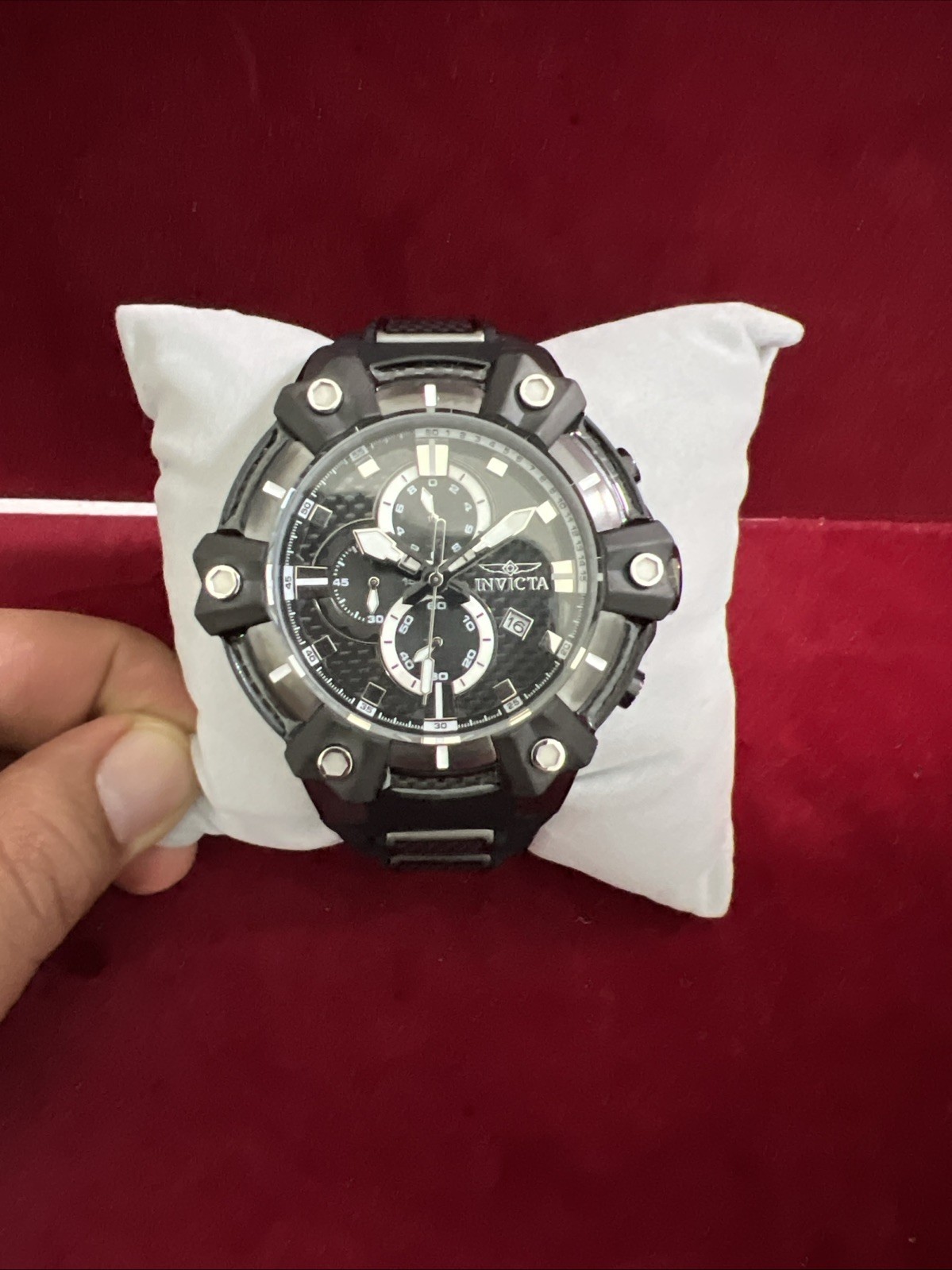 Invicta Carbon Hawk 37286 is a 54mm men’s watch with a black carbon fiber dial,