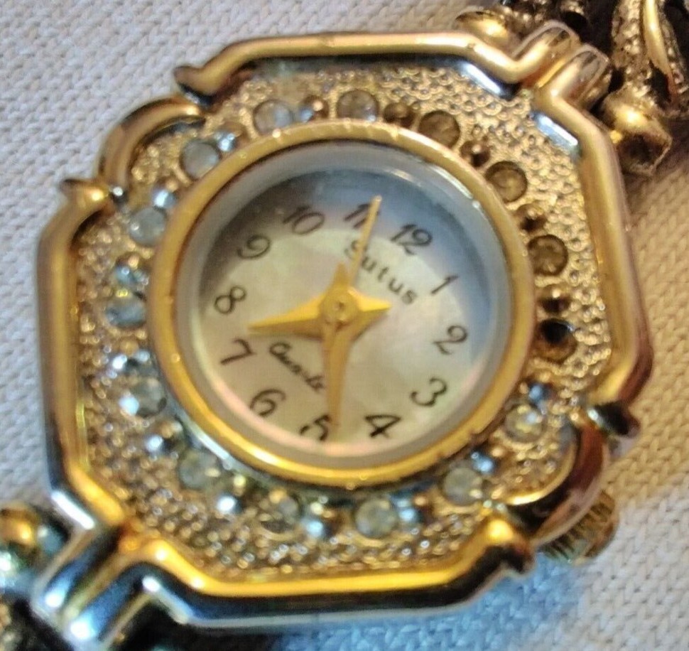 18K gold Sutus watch women’s fancy dress luxury ornate mother of pearl dial