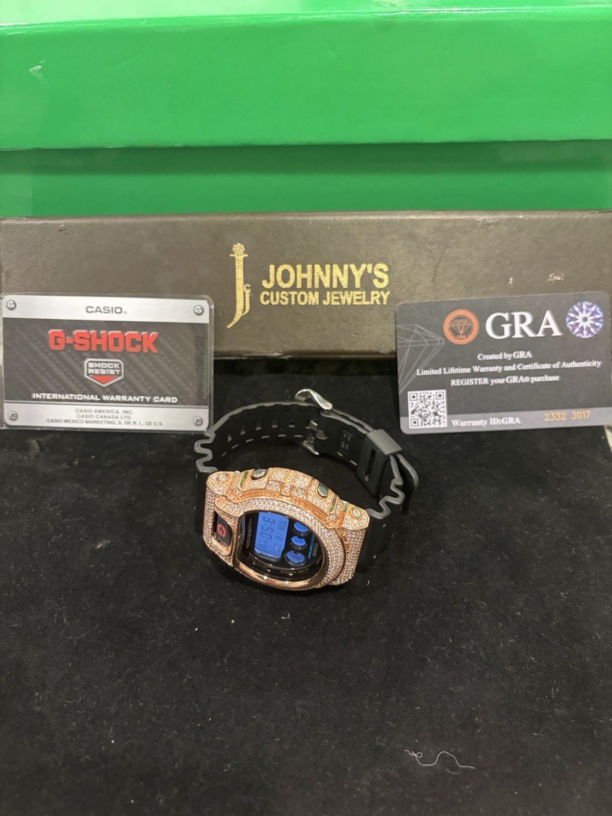 Casio G-SHOCK Digital Quartz Rose Gold Bezel Black Resin Strap 200m Papers