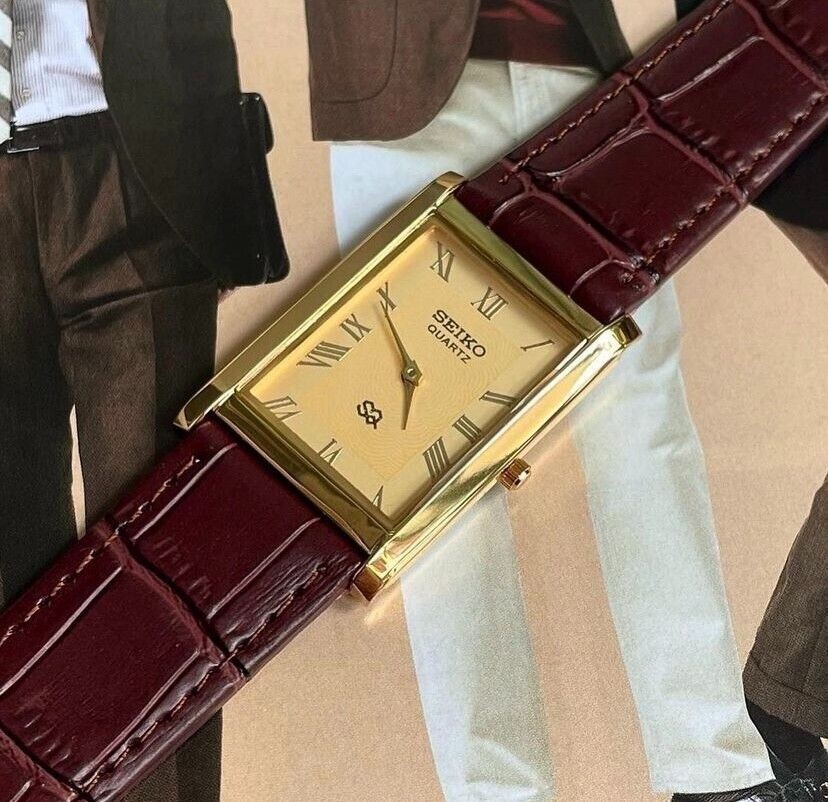 Vintage Seiko Slim Quartz Gold Face Rectangle Japanese 26MM Case Mens Watch S07