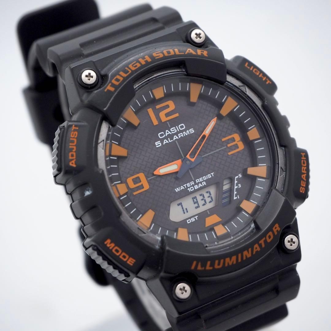 30-year-old working CASIO men’s analog-digital solar watch, black and orange