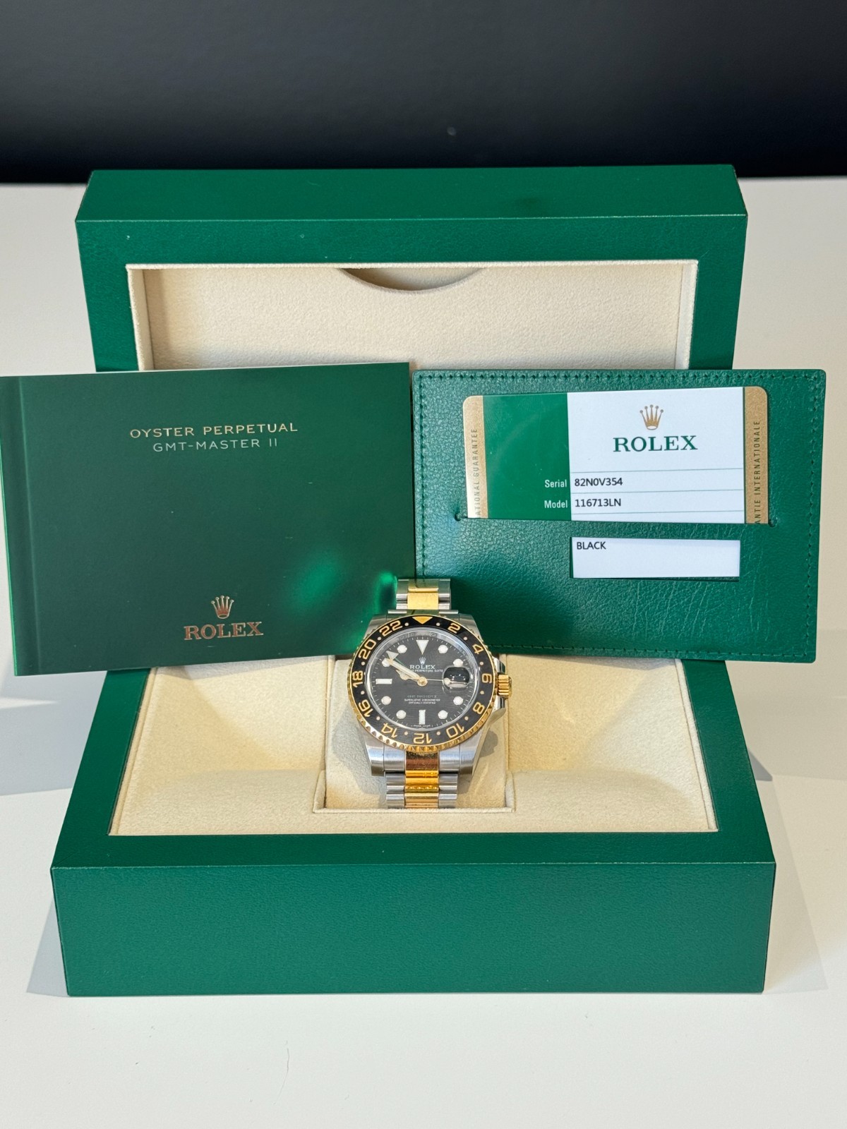 Rolex GMT-Master II 116713LN Silver and Gold Oyster Bracelet with Black Bezel