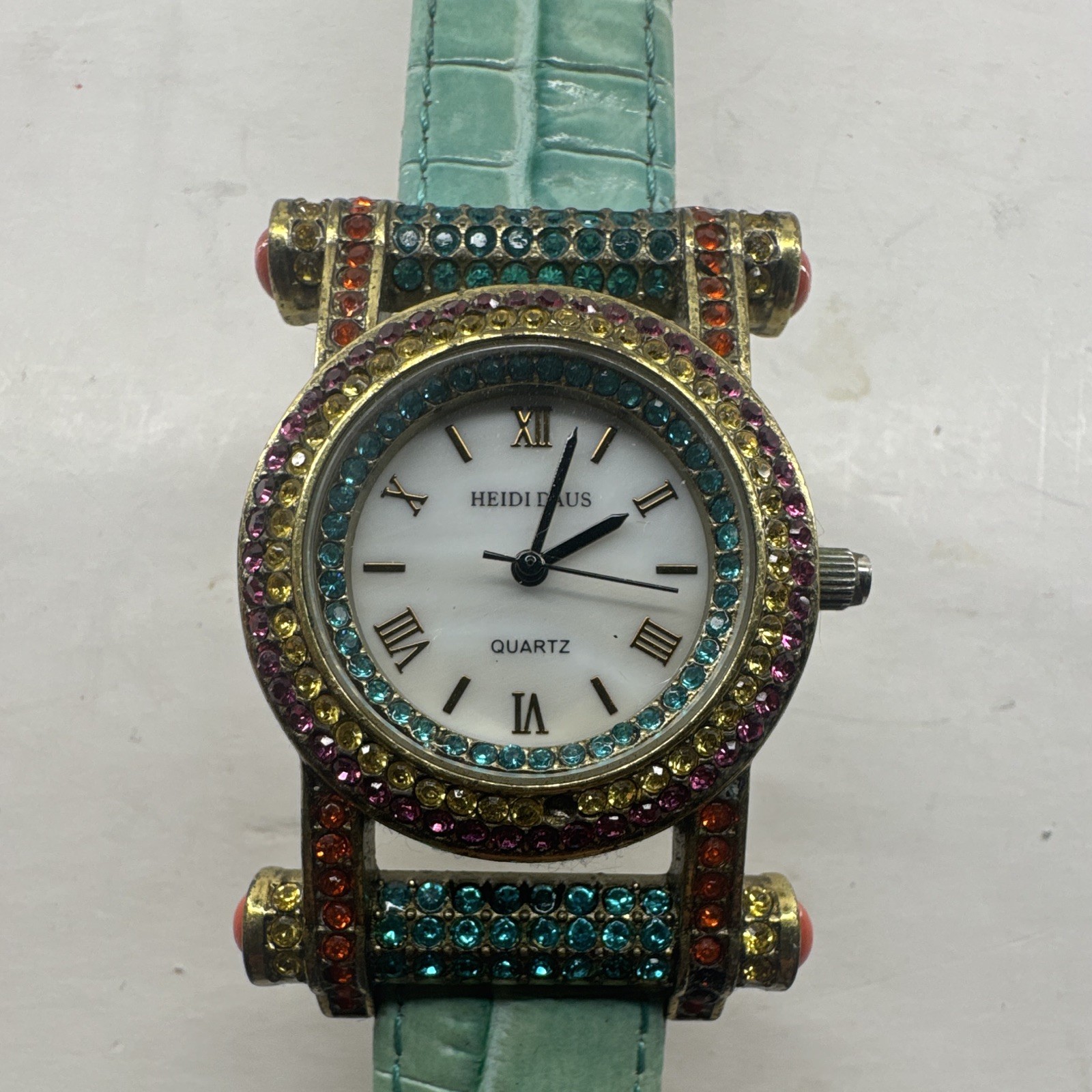 Heidi Daus Women’s Quartz Watch Blue Leather Strap Gem-Set Multicolor Bezel