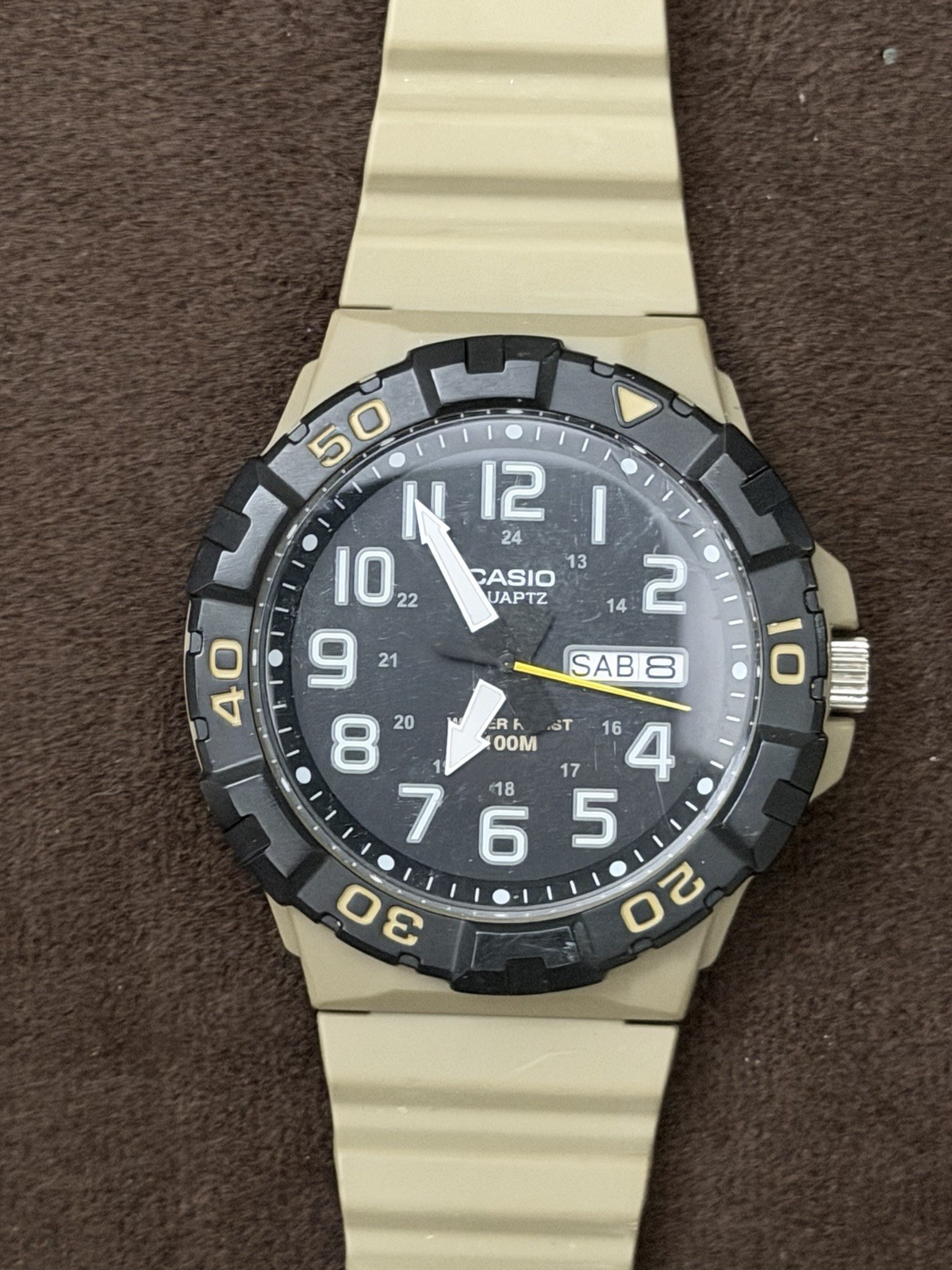 Casio MRW-210H Men’s Quartz Analog Watch Black Dial Day/Date Beige Resin 100m