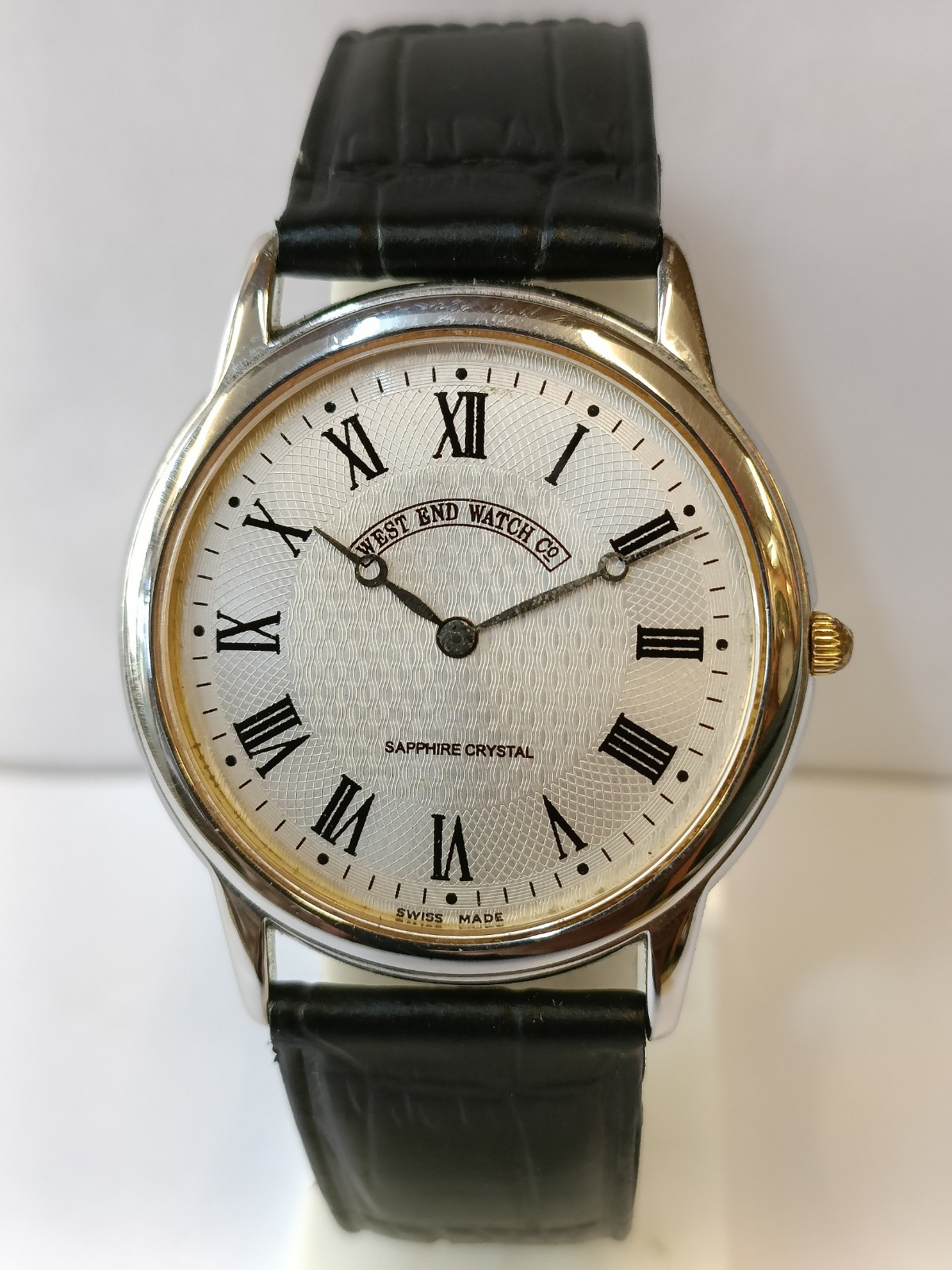 WEST END WATCH CO. QUARTZ SILVER DIAL SWISS MEN’S WORKING CONDITION