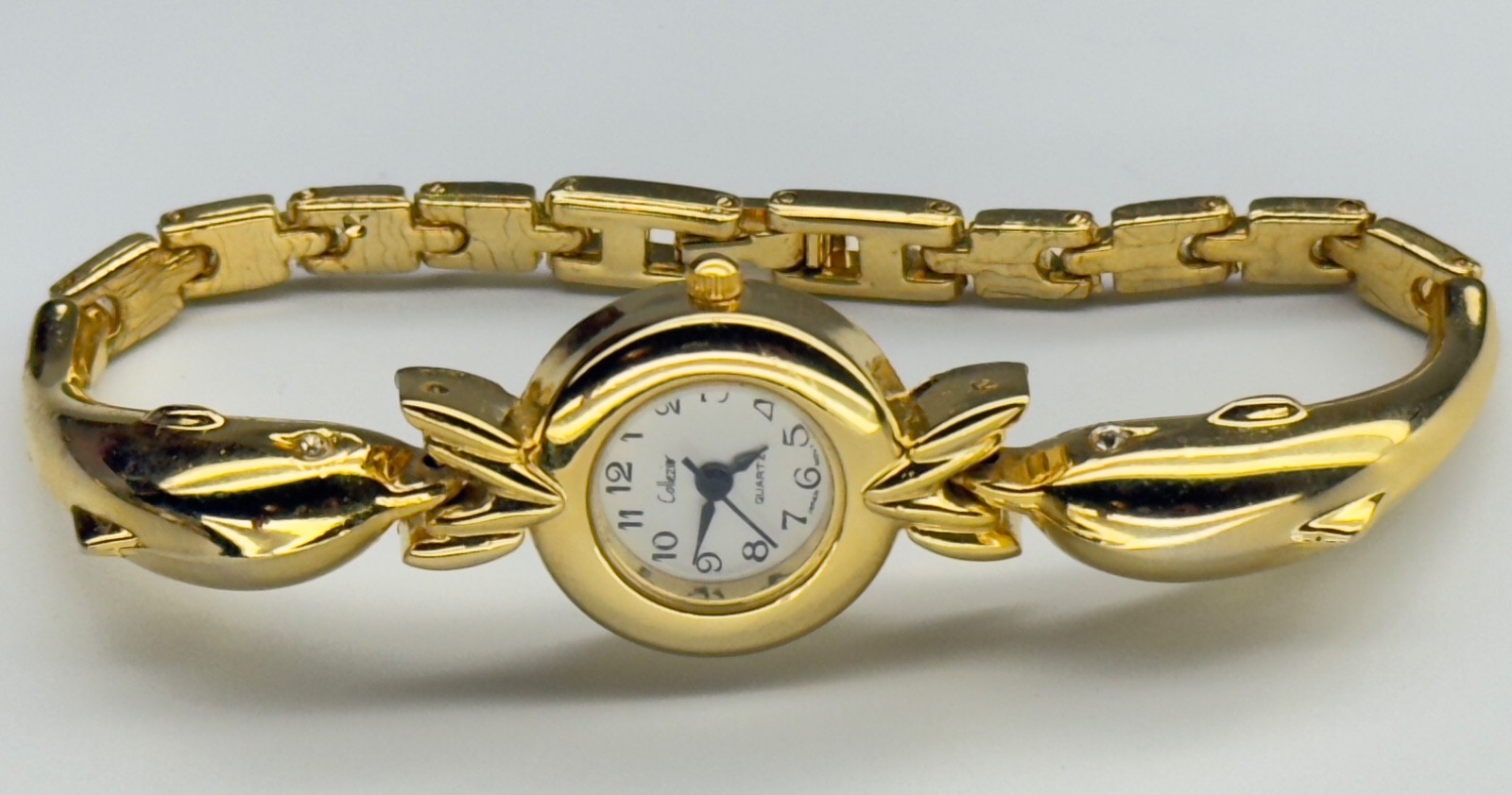 Women’s Collezio Quartz Wristwatch Gold Tone Dolphin Bracelet Analog Linked READ