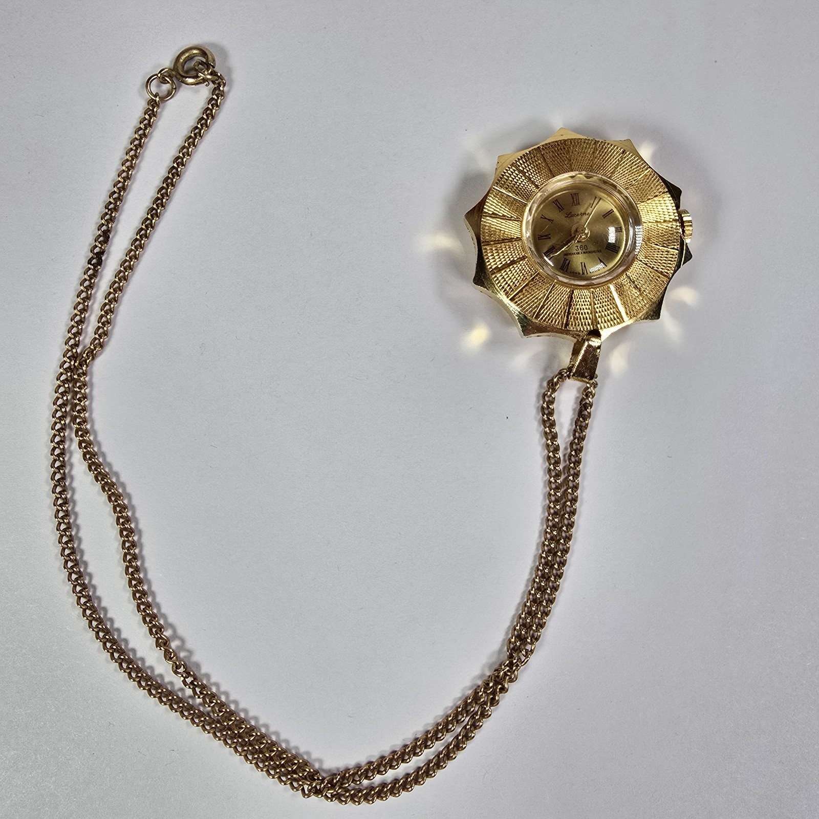 Vintage Lucerne 360 Mechanical Wind Necklace Watch Gold Tone Starburst Hong Kong