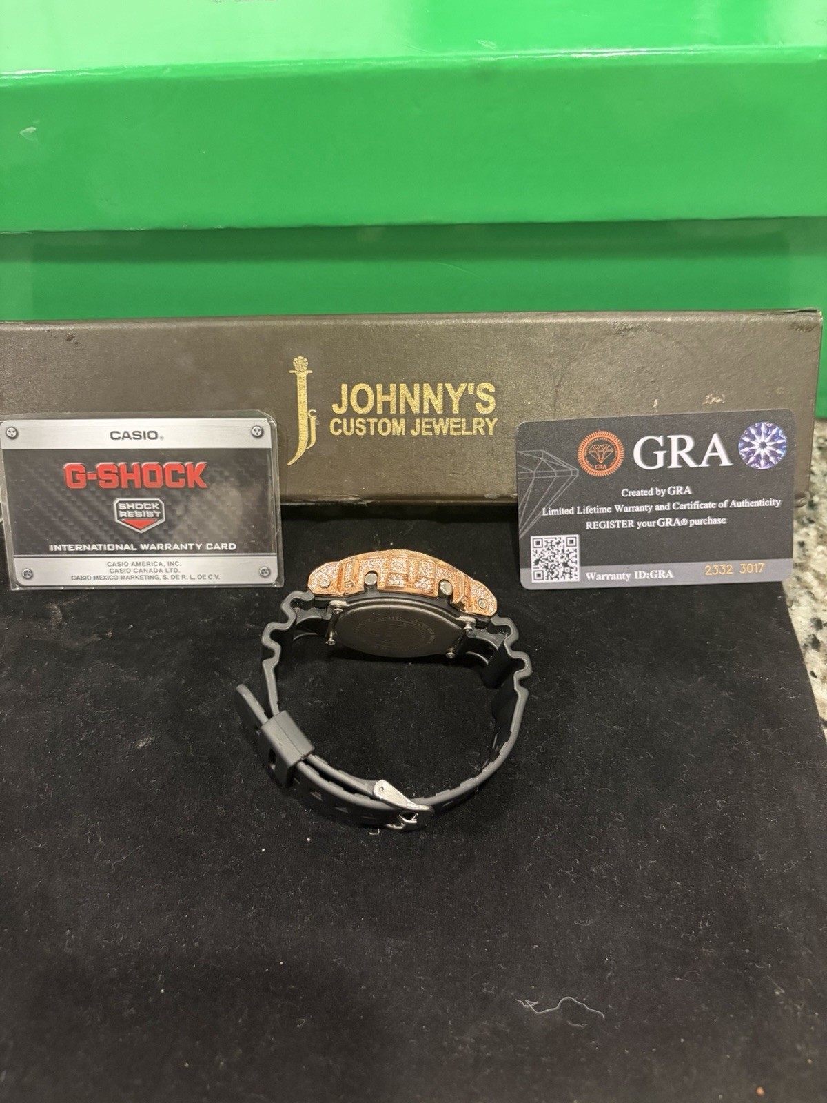 Casio G-SHOCK Digital Quartz Rose Gold Bezel Black Resin Strap 200m Papers