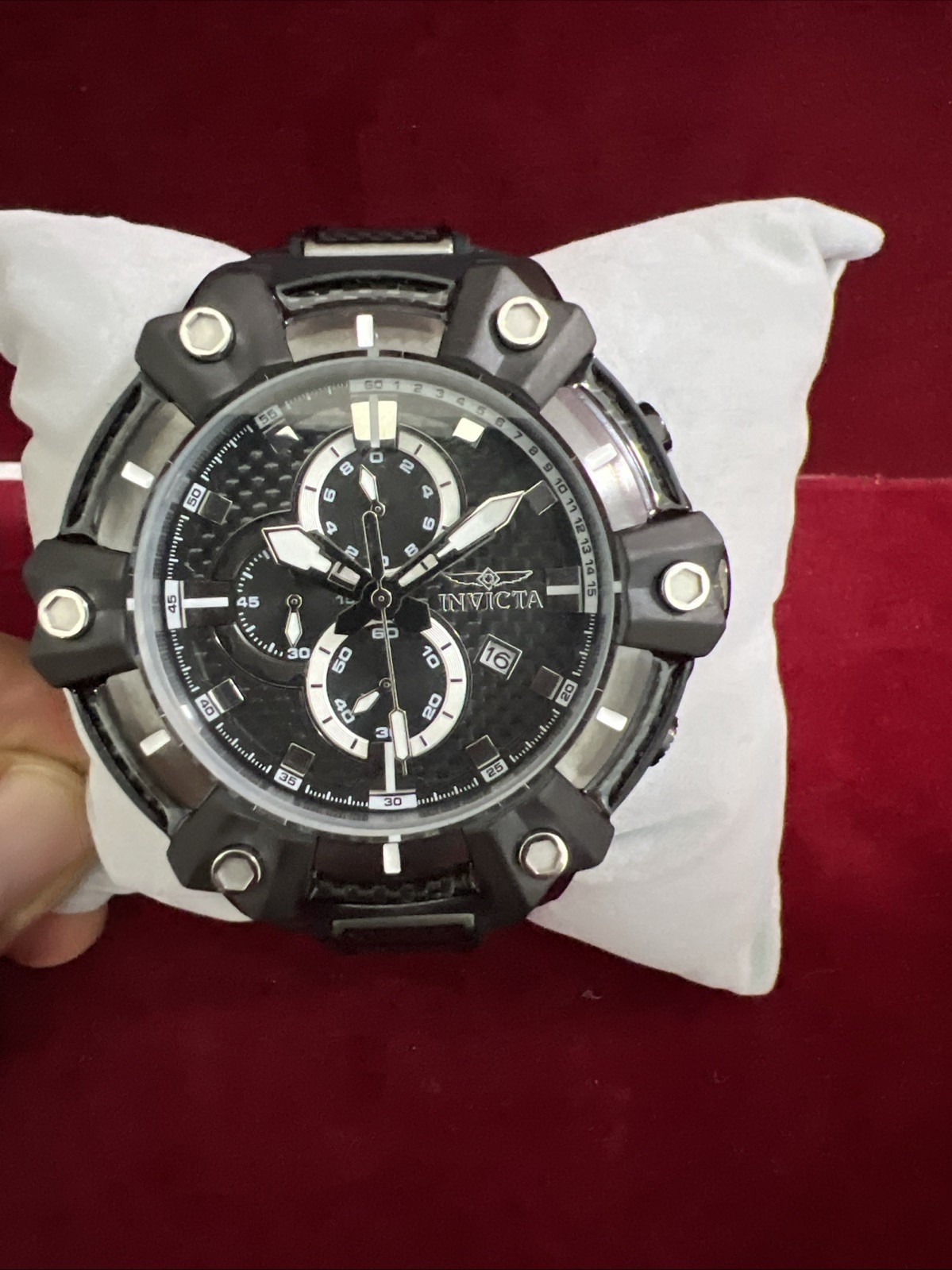 Invicta Carbon Hawk 37286 is a 54mm men’s watch with a black carbon fiber dial,