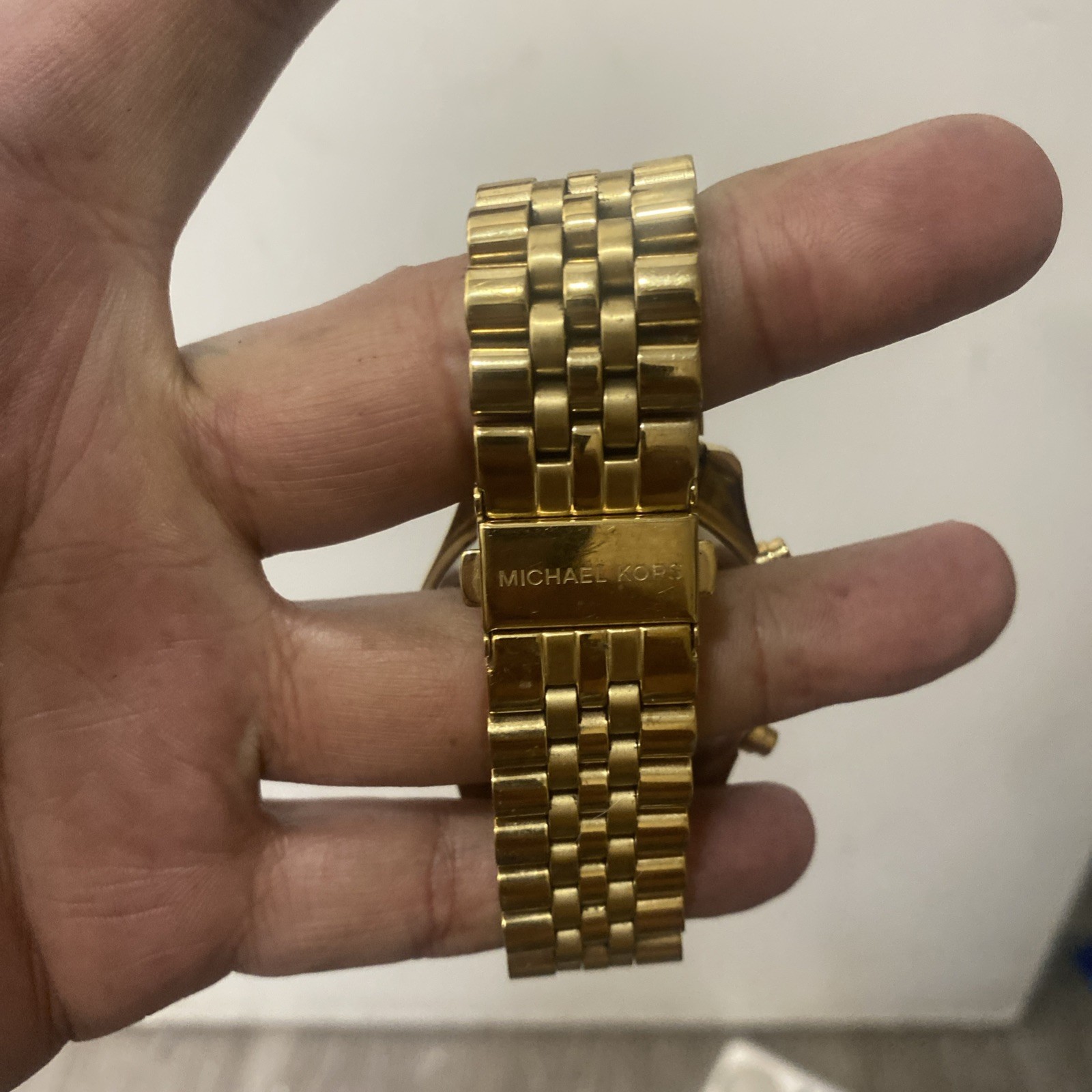 Michael Kors MK8286 Men’s Gold-Tone Black Dial Lexington Watch