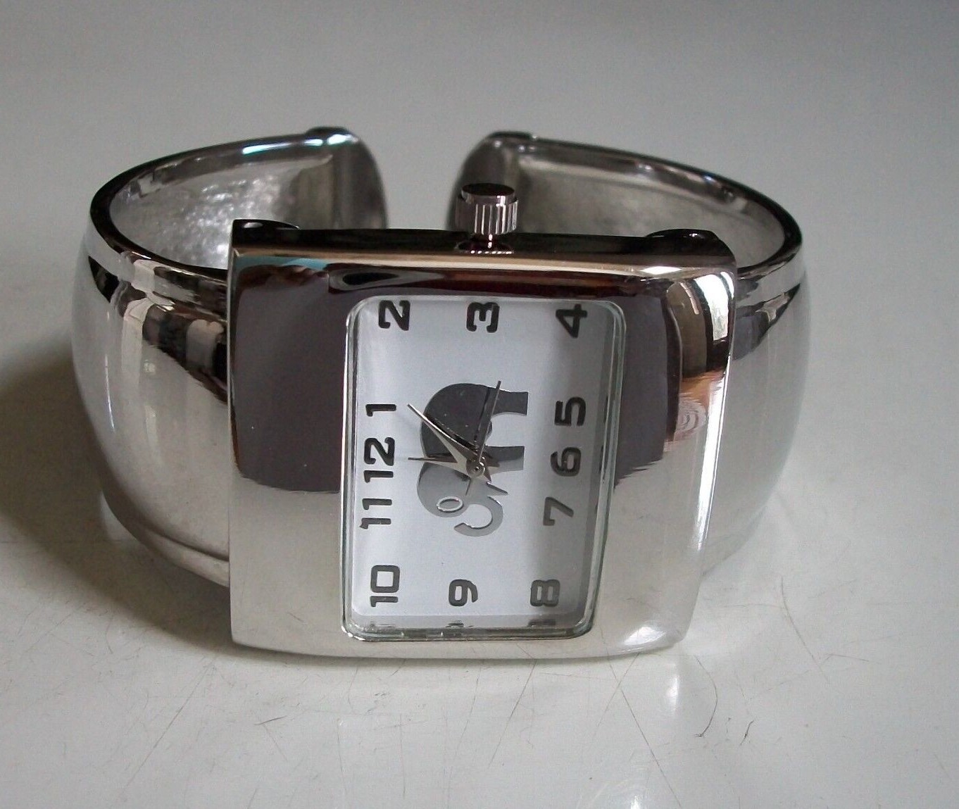 WOMEN’S RED, BLACK, SILVER NUMBER DIAL GOOD LUCK ELEPHANT CUFF BANGLE WATCH