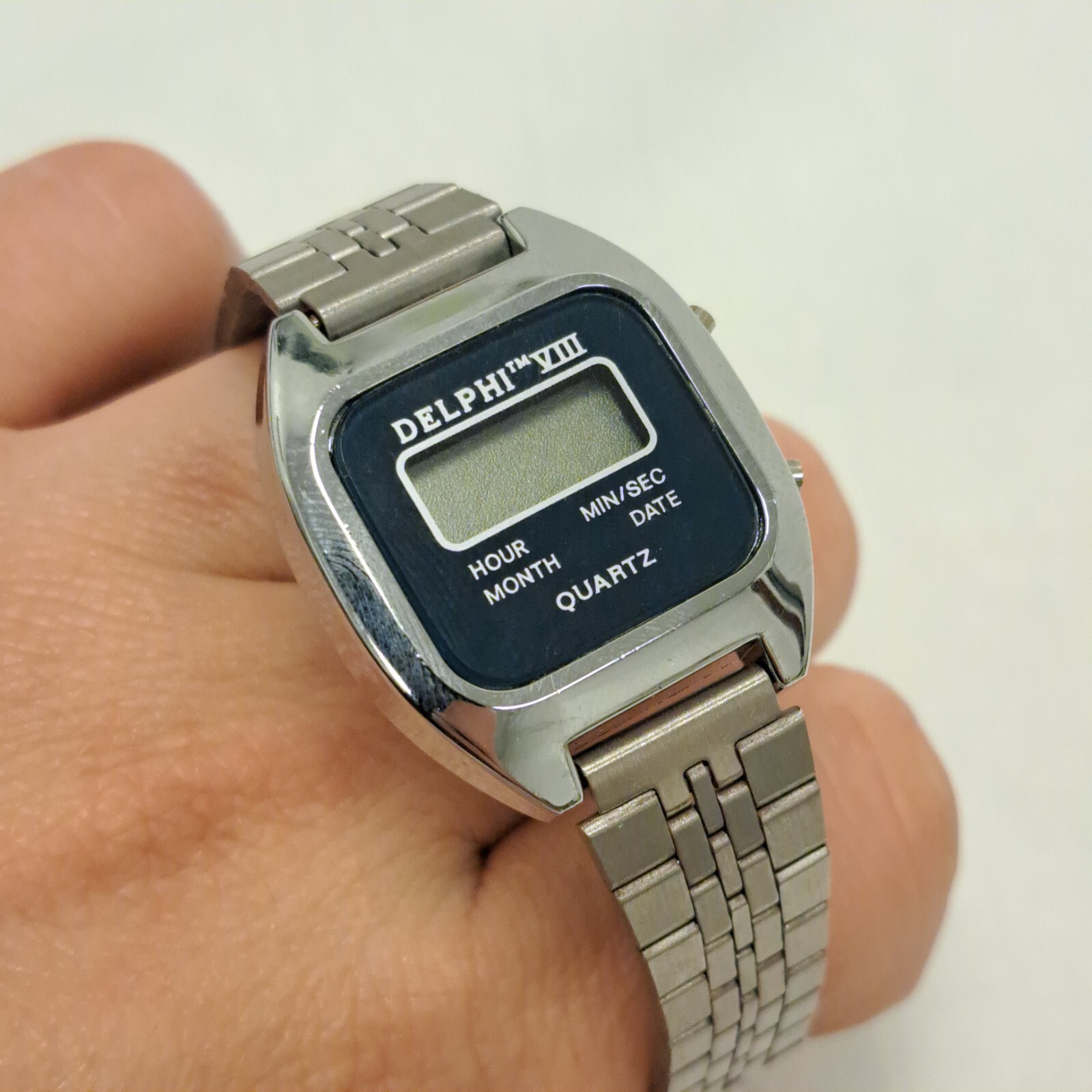 Vintage Delphi VIII Quartz LCD Womens Wrist Watch Blue/Silver Tone
