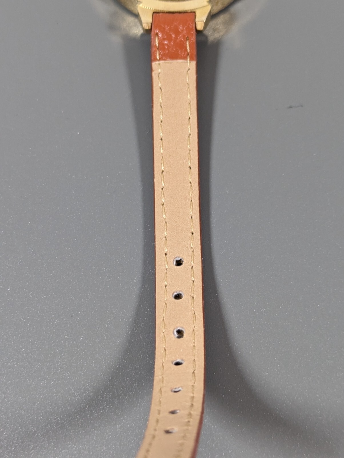 Womans Francesca’s Gold Tone Dial Crystal Accent Round Case Brown Band Watch