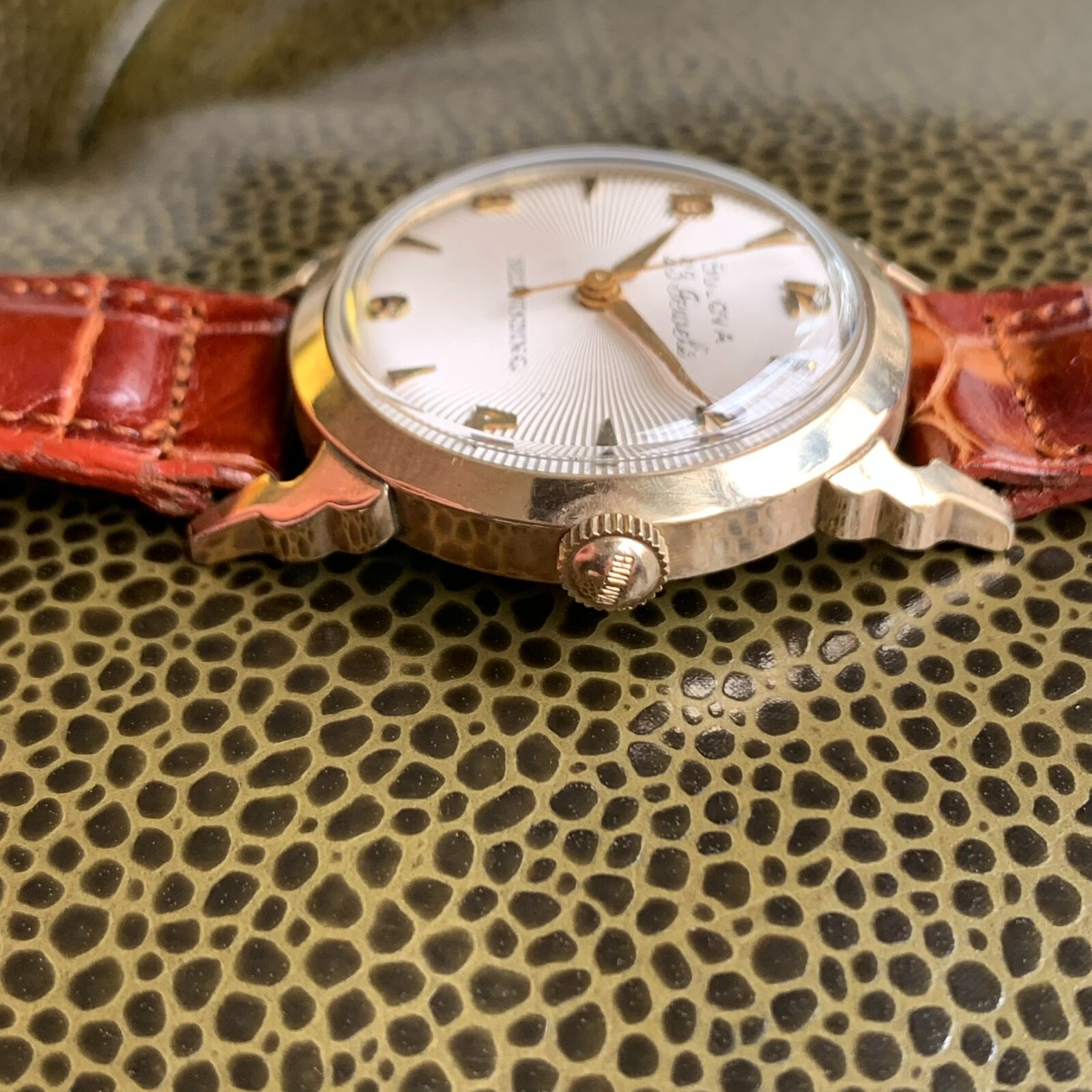 1957 Bulova 23 Jewels 10K Rolled Gold Plated Wristwatch White Sunburst Dial