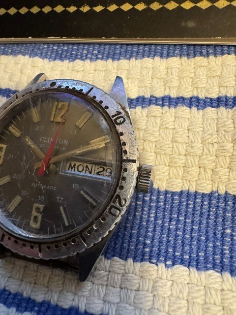 Vintage Clinton Watch- 25 Jewel Auto – Time Day Date – Still Ticking! No Band.