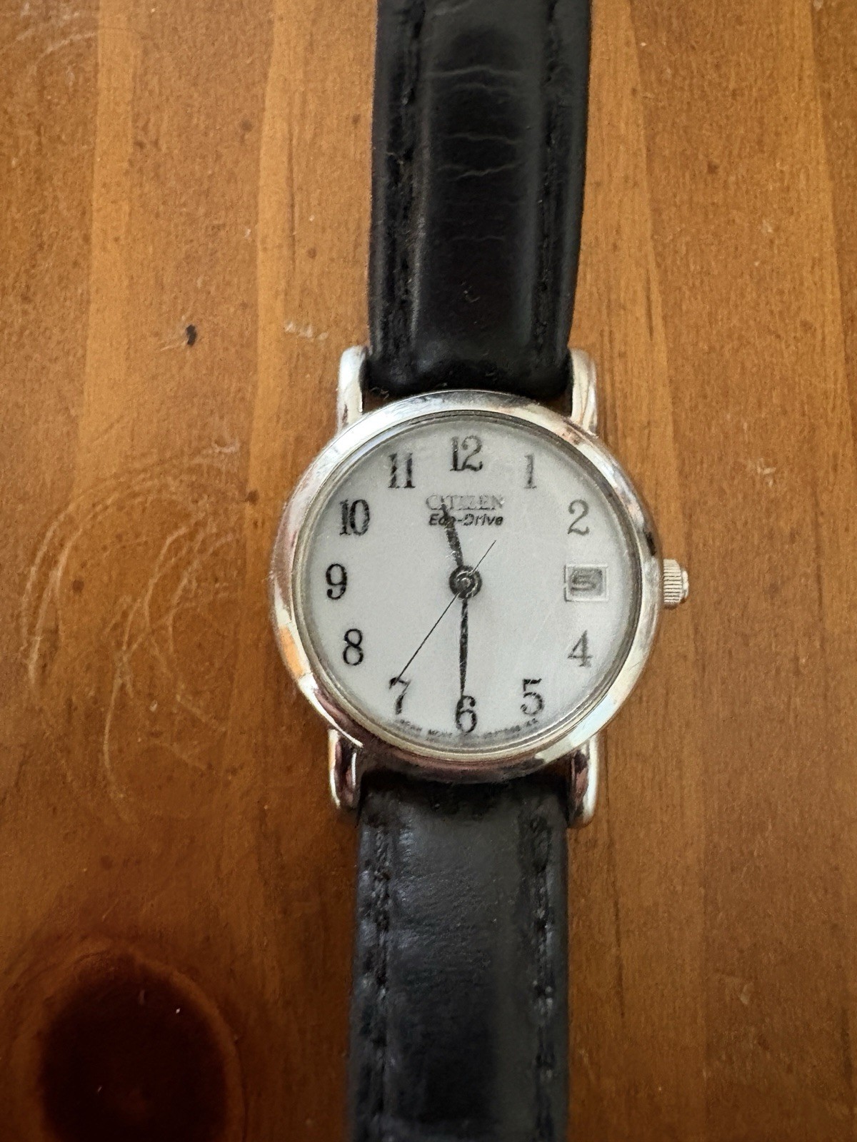 Citizen Eco-Drive Women’s Analog Quartz Watch White Dial Date Black Leather