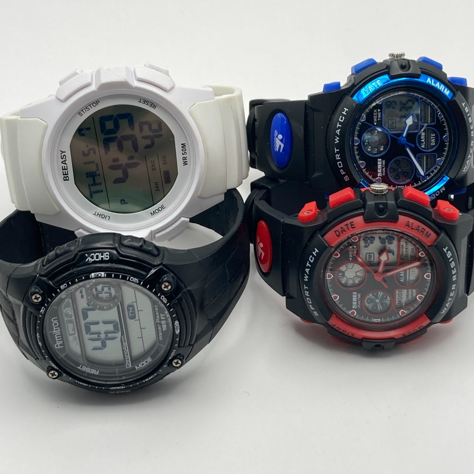 Lot of 4 Men’s Watches Digital Armitron Skmei Black White Red Alarm Date Chrono