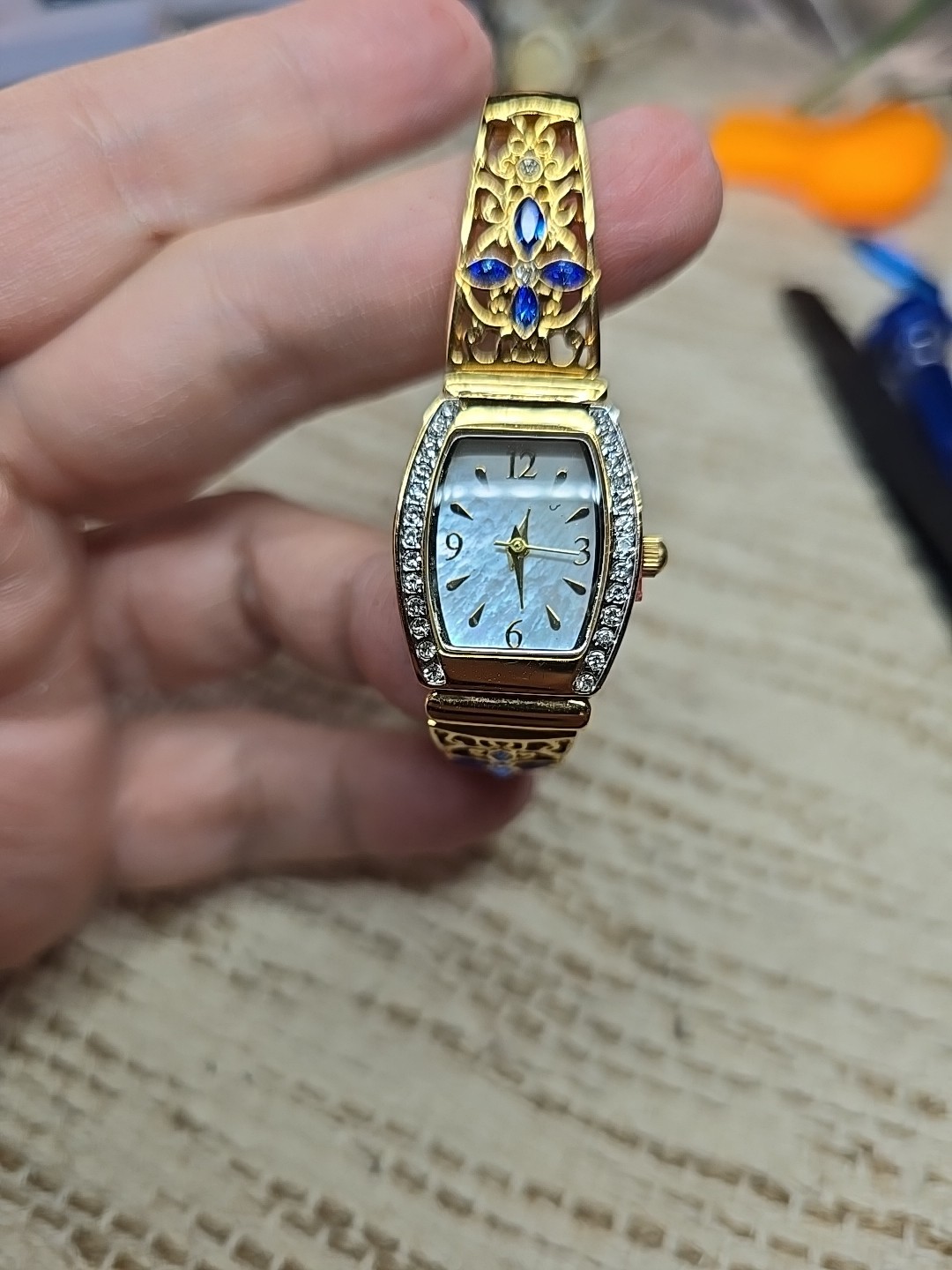 Bradford Exchange Moments of Faith” Ladies Stretch Watch Goldtone Blue MOP Face