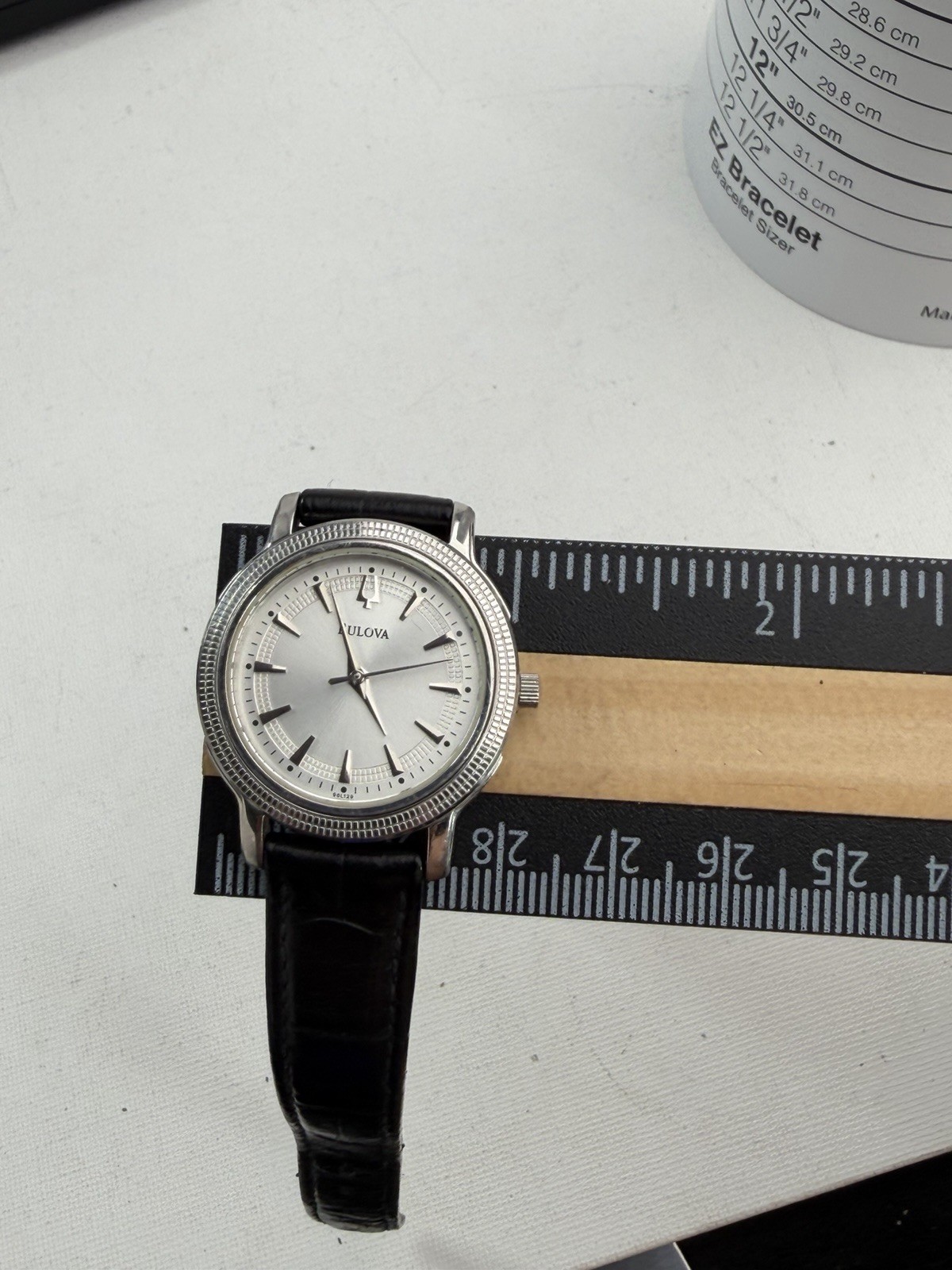 Bulova Metro Men’s Analog Watch Silver Dial Black Leather Band No Date