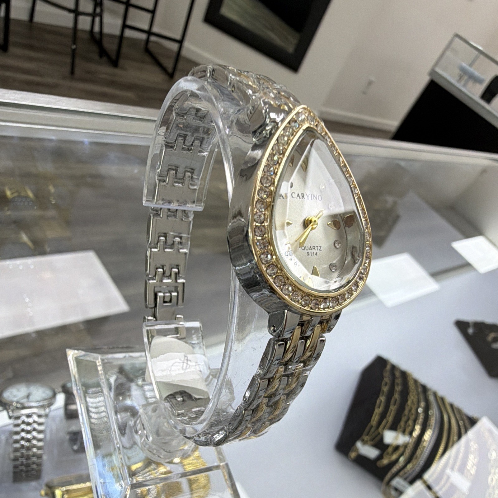 Caryino Women’s Quartz Analog Teardrop Dress Watch Two-Tone Bracelet Silver Dial