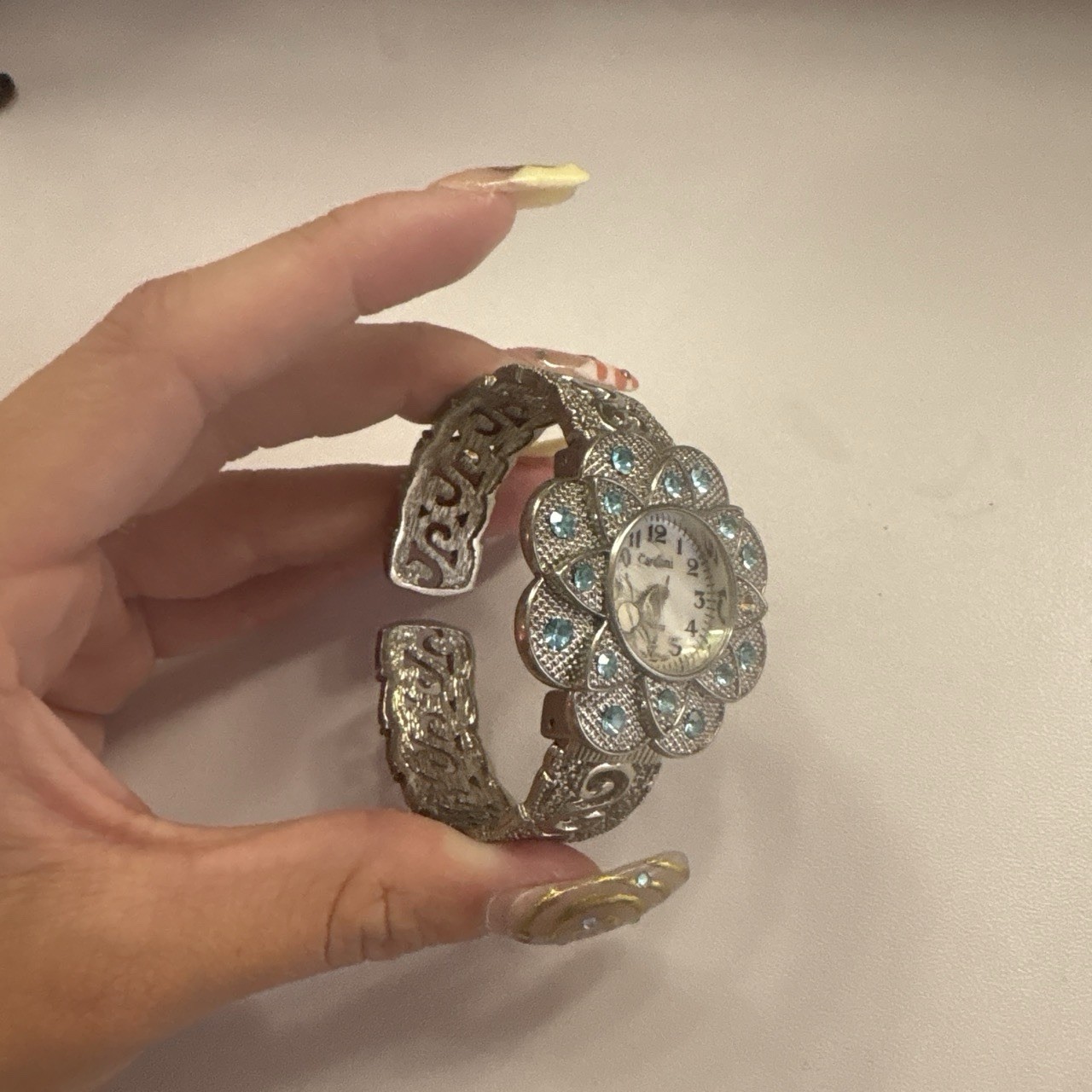 Cardini Women’s Quartz Silver Tone Bangle Wristwatch Floral Crystal Bezel