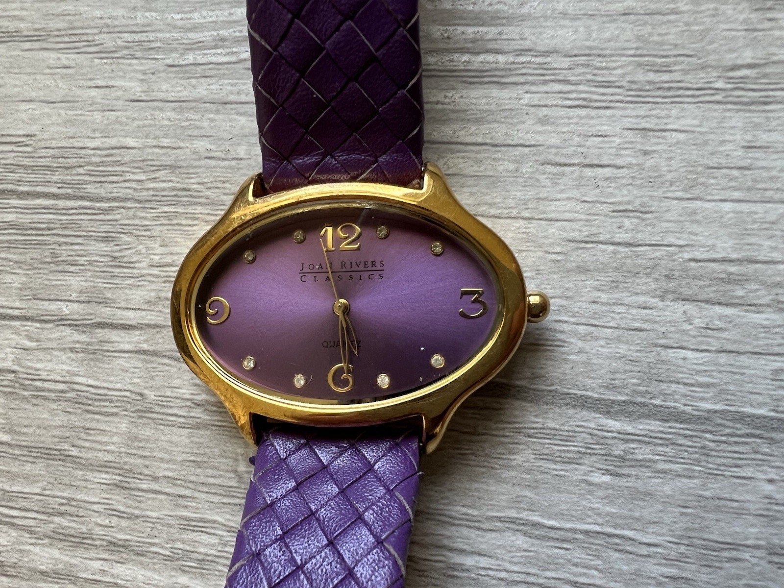 Joan Rivers Classics V377 Women’s Watch – Purple Dial & Woven Leather – New Batt