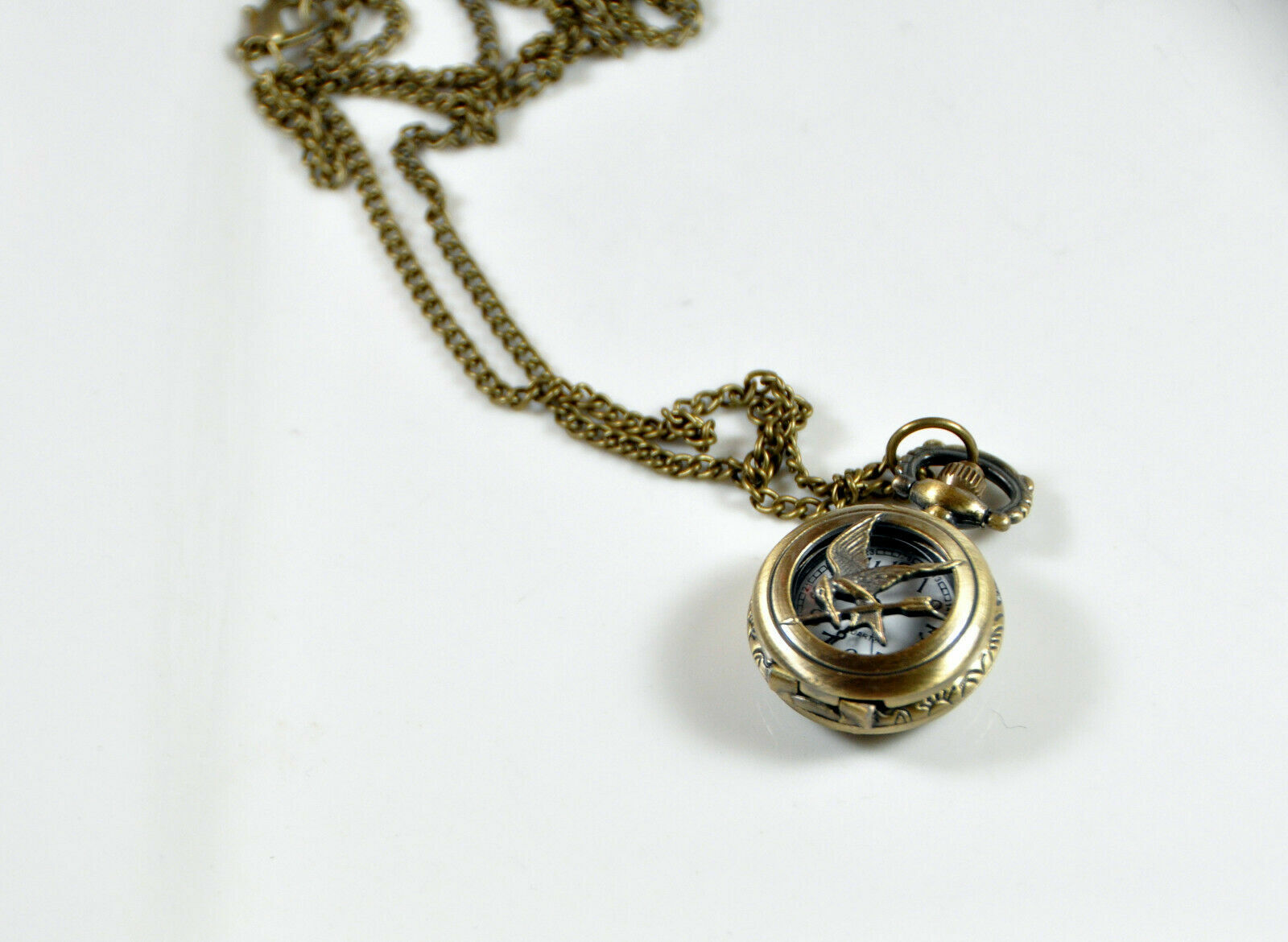 Hunger Game Bird Carving Flip Cover Style Antique Bronze Pocket Watch Necklace