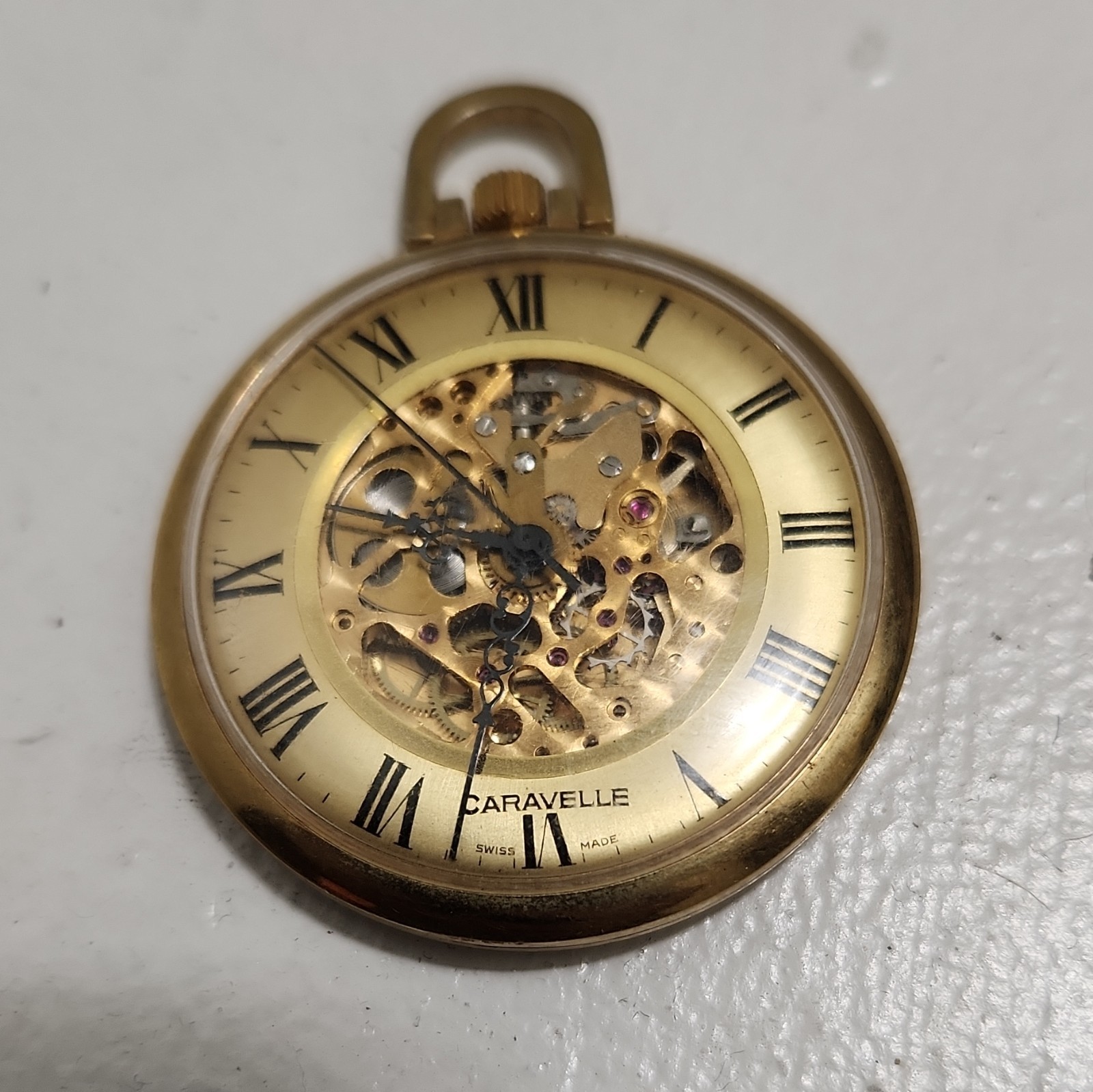 Caravelle Skeleton Dial Pocket Watch Manual Roman Numerals Gold Plated(